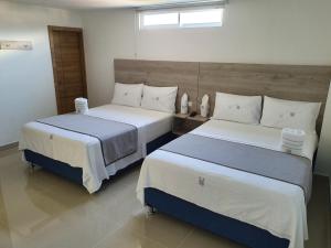 HOTEL A1 EXPRESS客房内的一张或多张床位