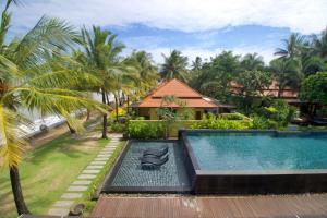 Bazén v ubytování Chongfah Resort Khao Lak - SHA Extra Plus nebo v jeho okolí