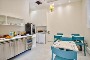 Kuchyň nebo kuchyňský kout v ubytování The Suites – Piazza Kirkop