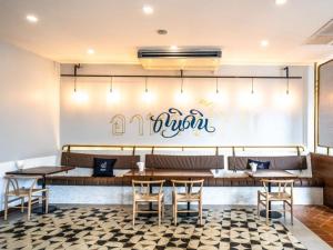Botanic Service Room at Impact Muangthongthani - SHA Certified餐厅或其他用餐的地方
