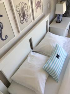 Łóżko lub łóżka w pokoju w obiekcie Apartamenty Pogodna
