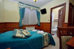 Uma cama ou camas num quarto em Api IV Zakopane
