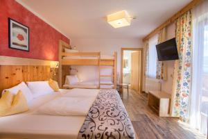 Postel nebo postele na pokoji v ubytování Panoramahotel Burgeck