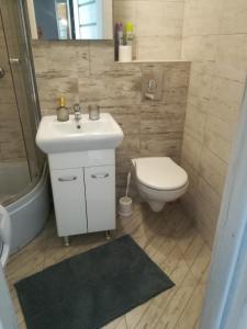 Ванна кімната в Apartament Centrum Chmielna +16 фото