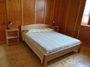 Posteľ alebo postele v izbe v ubytovaní Casa vacanze La Maddalena