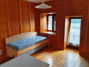 Posteľ alebo postele v izbe v ubytovaní Casa vacanze La Maddalena