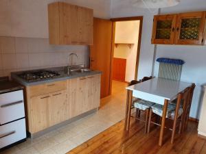 Kuchyňa alebo kuchynka v ubytovaní Casa vacanze La Maddalena