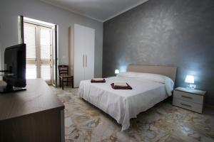 Cama o camas de una habitación en Dimora Varchi