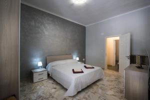 Postel nebo postele na pokoji v ubytování Dimora Varchi