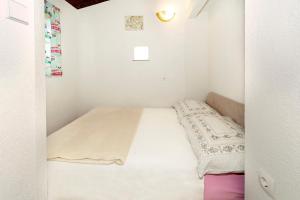 Camp Mali bungalow tesisinde bir odada yatak veya yataklar