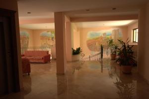 Posezení v ubytování Hotel La Grotte