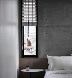 Letto o letti in una camera di Monka Hotel