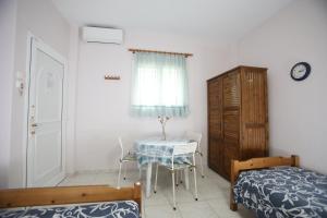 Letto o letti in una camera di Pavlidis