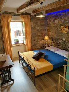 Postel nebo postele na pokoji v ubytování Wine House Rakar