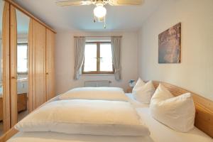 Postel nebo postele na pokoji v ubytování Ferienwohnung Staig