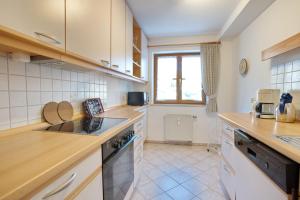 Kuchyň nebo kuchyňský kout v ubytování Ferienwohnung Staig