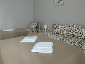 Postel nebo postele na pokoji v ubytování Apartments na Beregu + 37 fotografií