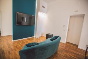 TV a/nebo společenská místnost v ubytování Suites of the Royal Council