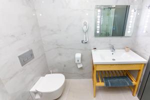 Koupelna v ubytování Delight Hotel