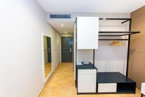 Kuchyň nebo kuchyňský kout v ubytování Delight Hotel