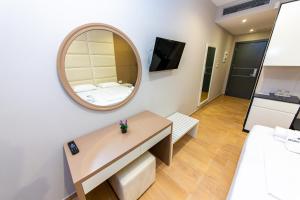 TV a/nebo společenská místnost v ubytování Delight Hotel