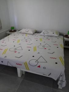 Postel nebo postele na pokoji v ubytování Coin de Paradis,Pavillon Doucimar