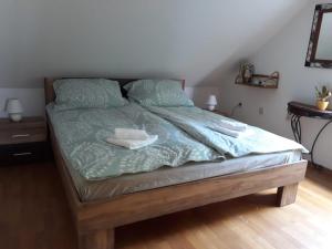 Кровать или кровати в номере Apartma Dolomiti