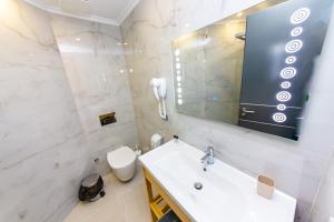 Koupelna v ubytování Delight Hotel