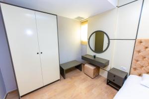 Postel nebo postele na pokoji v ubytování Delight Hotel