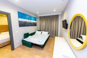 Postel nebo postele na pokoji v ubytování Delight Hotel