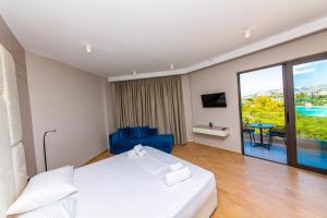 Postel nebo postele na pokoji v ubytování Delight Hotel