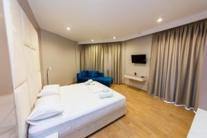 Postel nebo postele na pokoji v ubytování Delight Hotel