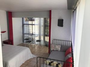 Кровать или кровати в номере Hotel du Porge