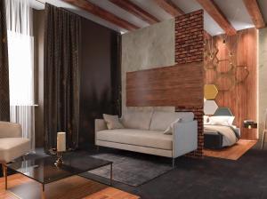 a living room with a couch and a bed at Dimora Frattina in Rome