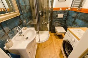 Kúpeľňa v ubytovaní Apartament EmeryK