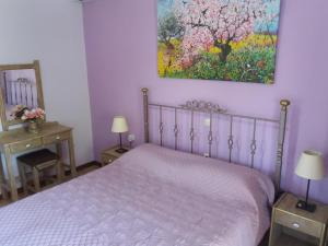 Postel nebo postele na pokoji v ubytování Alexandra Spingou Apartments