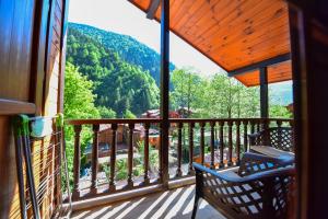 a balcony with a view of a mountain at Hirande Uzungöl in Uzungol