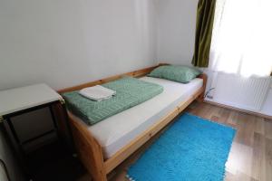 Postel nebo postele na pokoji v ubytování Guesthouse Veles