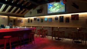 TV a/nebo společenská místnost v ubytování Hotel Alpfrieden