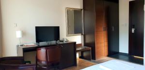 TV i/ili zabavni centar u objektu Lucic Rooms & Suites