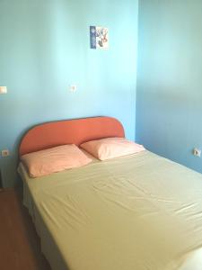 Postel nebo postele na pokoji v ubytování Apartments Sandra