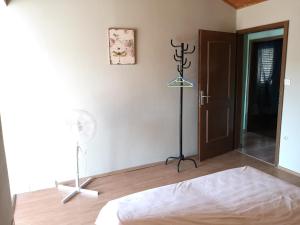 Postel nebo postele na pokoji v ubytování Apartments Sandra