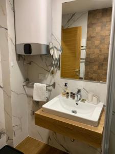 Un baño de Apartman AMIGO & Spa 19 fotos más