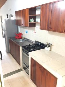 Una cocina o zona de cocina en Condominio El Portal Casa 5