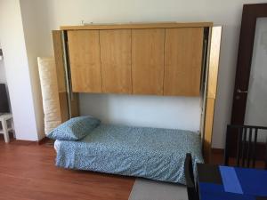 a bedroom with a bed and a cupboard at Bellagio Dream in Valbrona +45 photos