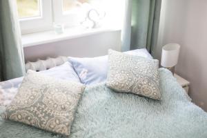 Posteľ alebo postele v izbe v ubytovaní Apartament uJasia + 4 fotografie