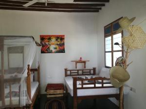 Postel nebo postele na pokoji v ubytování Furaha Lodge