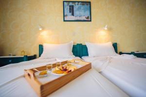 Ένα ή περισσότερα κρεβάτια σε δωμάτιο στο Villa Anna Maria