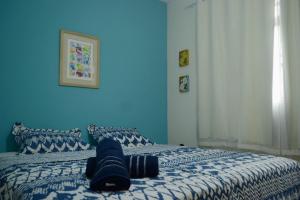 Llit o llits en una habitació de A Casa Morro do Moreno