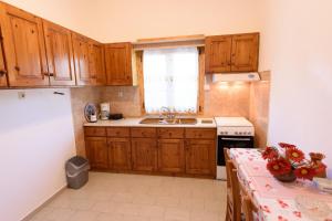 Kuchyň nebo kuchyňský kout v ubytování Johnie's Villa